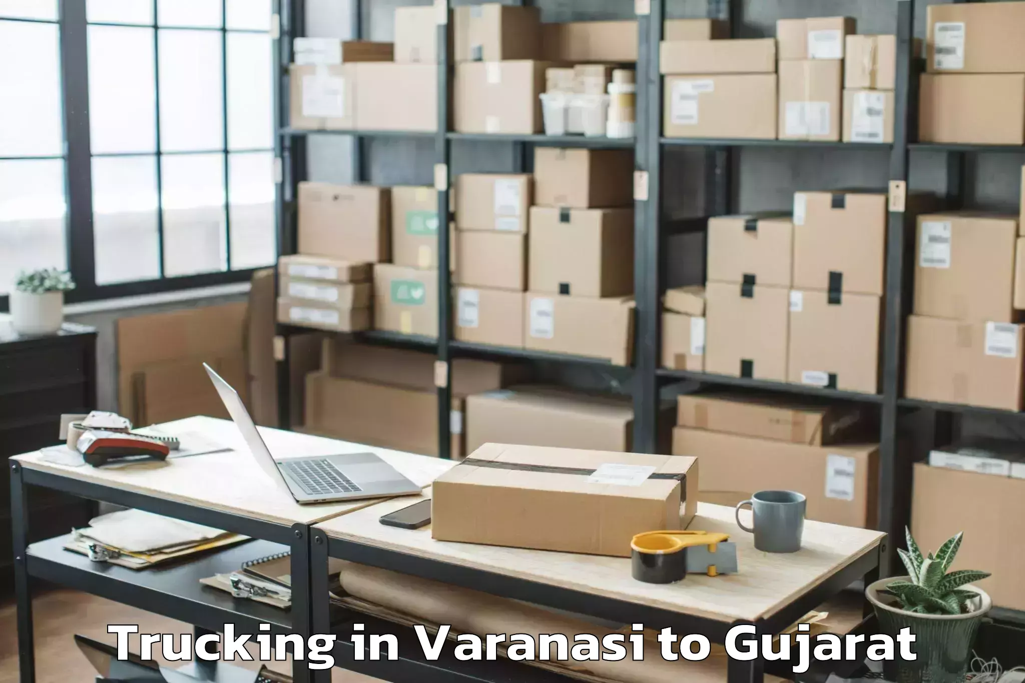 Get Varanasi to Vansada Trucking